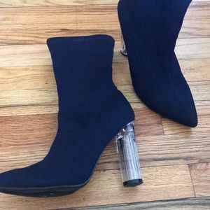 Dark navy sock booties with clear heel